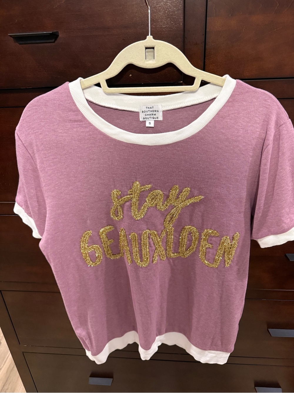 Purple 'Stay Geauxlden' Ringer Tee